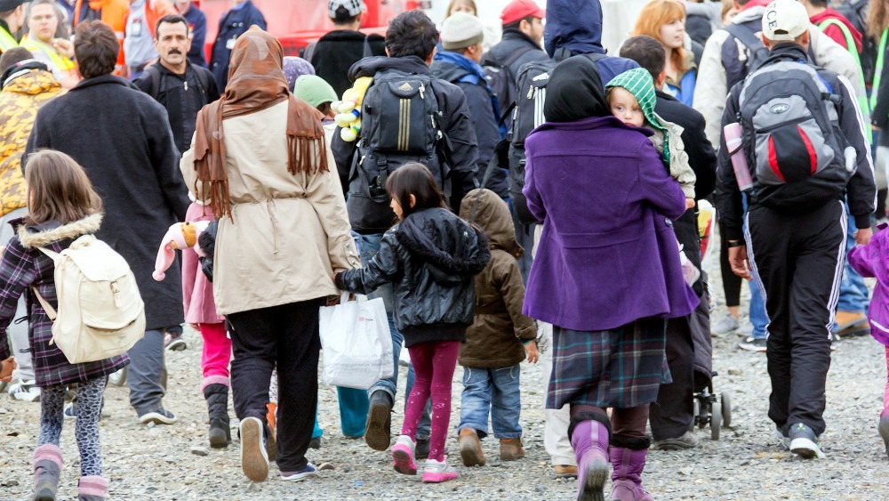 פליטים מגיעים לראשונה לגרמניה בתחנת הרכבת של שדהת קלן-בון